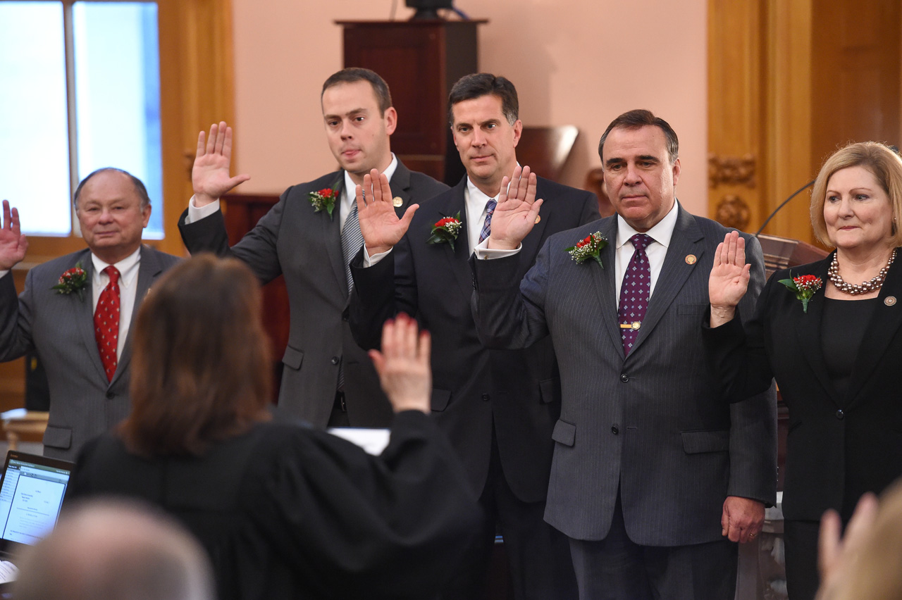 Rep. Zeltwanger, center, is sworn in to the 132nd  General Assembly.