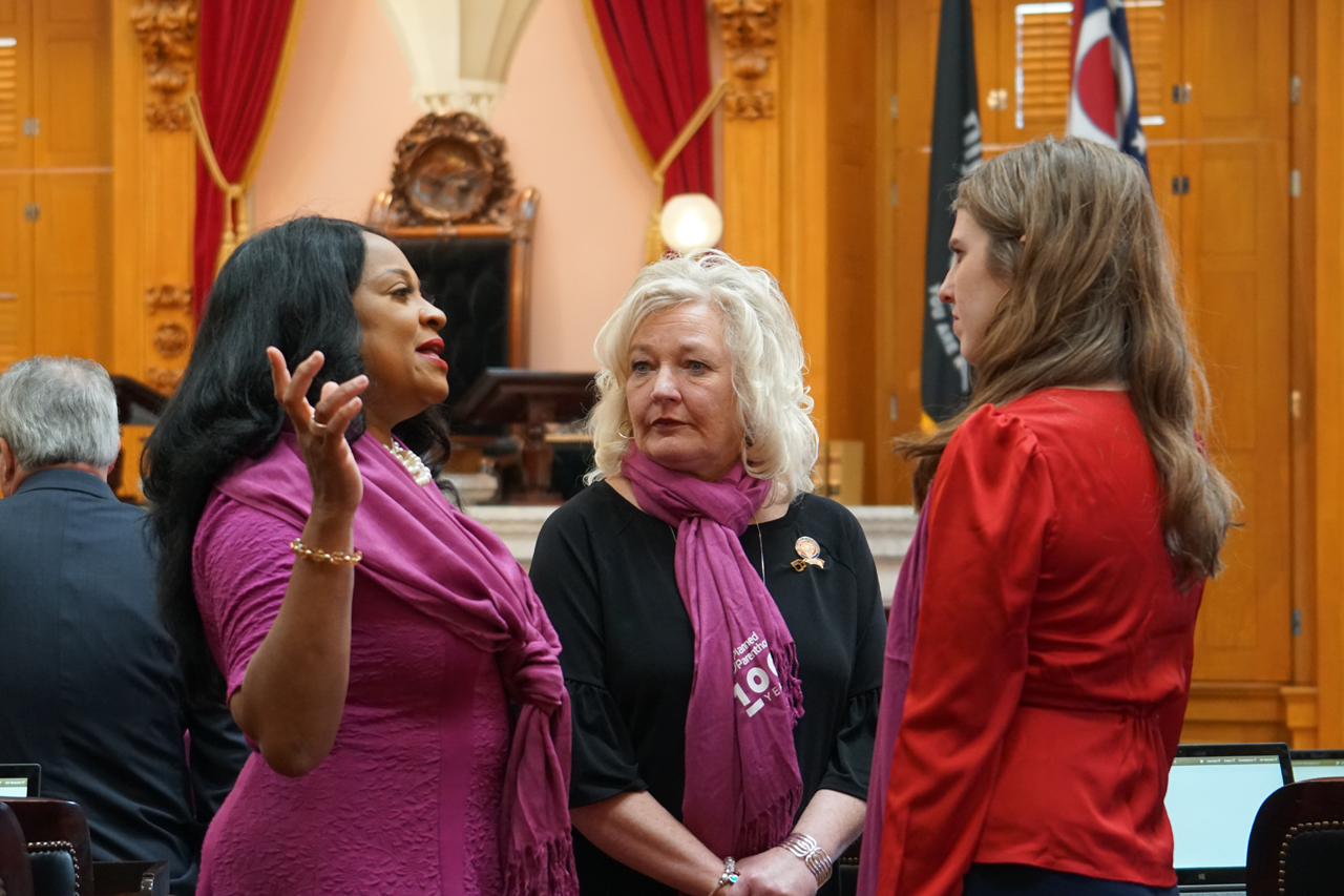 Rep Galonski speaks with Reps. Lisa Sobecki (D-Toledo) and Bride Rose Sweeney (D-Cleveland) before House session