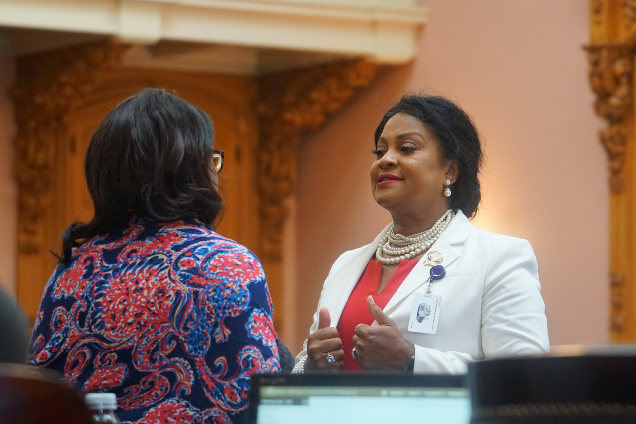 Rep. Galonski speaks with Leader Emilia Strong Sykes (D-Akron) before House session