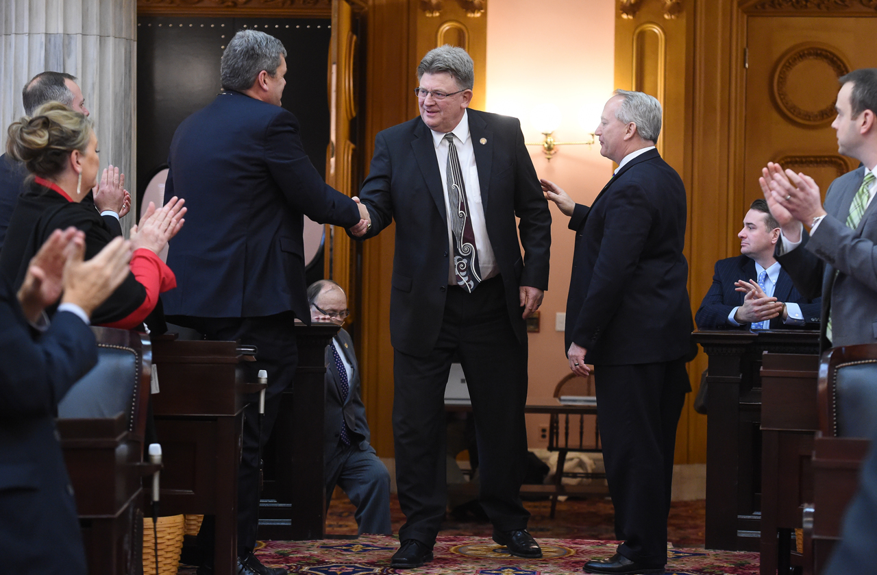 Rep. Hoops is congratulated by other representatives after his election to the seat.