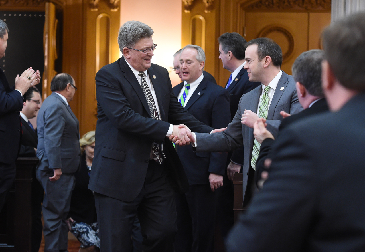 Rep. Hoops is congratulated by other representatives after his election to the seat.