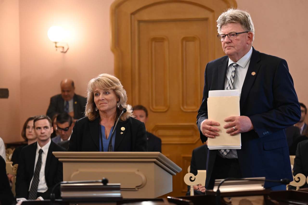 Reps. Hoops and Ray listen to members ask questions about their legislation.