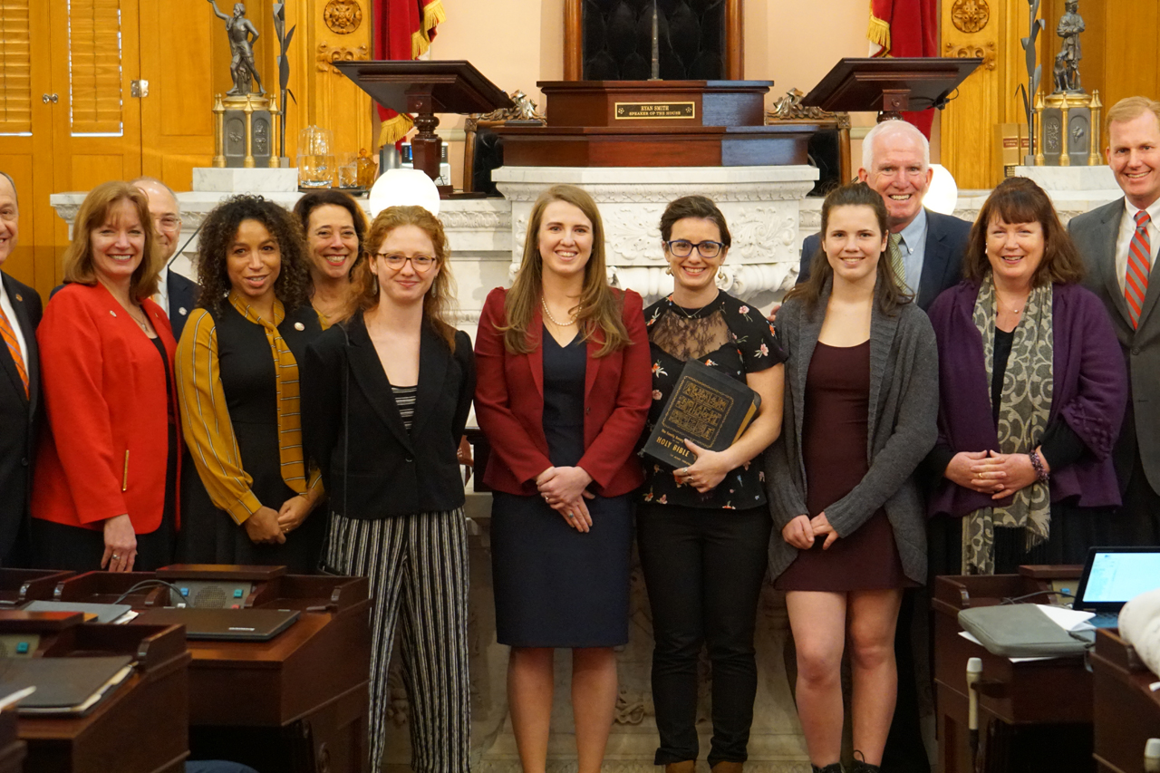 Rep. Bride Sweeney with her family and House members after being sworn in to the 132nd General Assembly