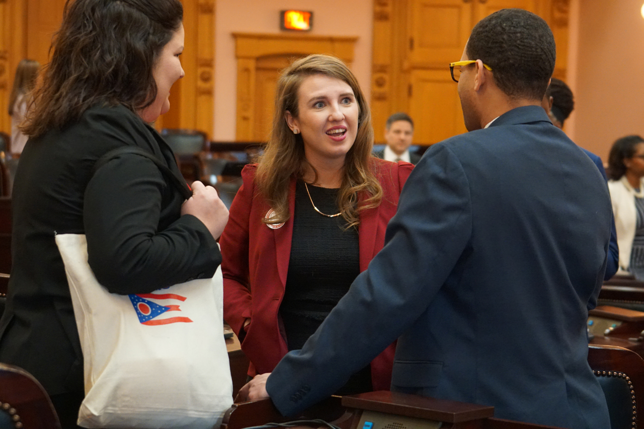 Rep. Sweeney talks with Reps. Jessica Miranda (D-Forest Park) and Sedrick Denson (D-Bond Hill) after House Session