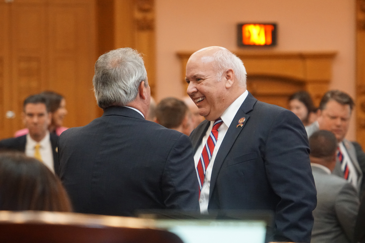 Rep. Skindell speaks with Rep. Richard Brown (D-Canal Winchester) before House Session