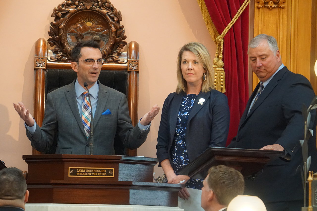 Rep. Russo stands in front of the House Session prior to the prayer and pledge of allegiance