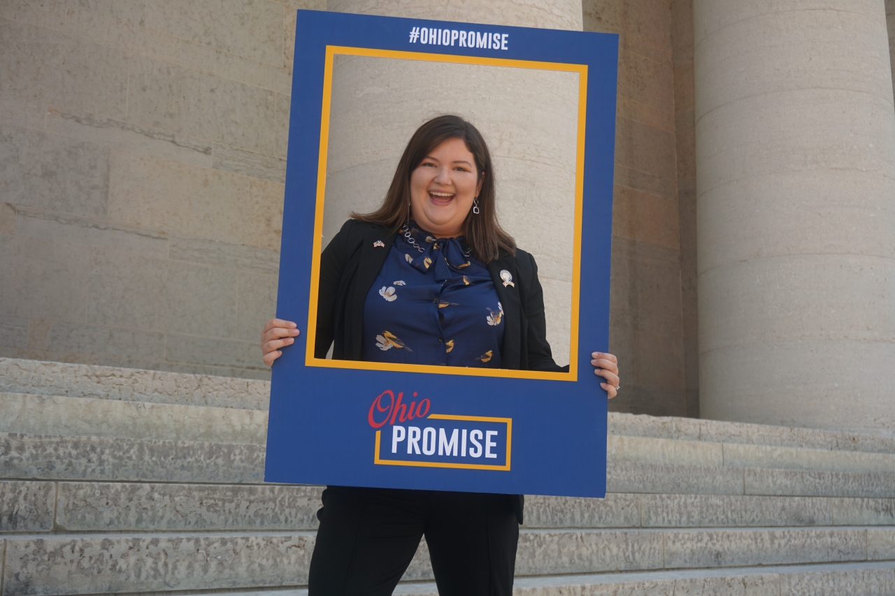 Rep. Miranda poses with the Ohio Promise frame