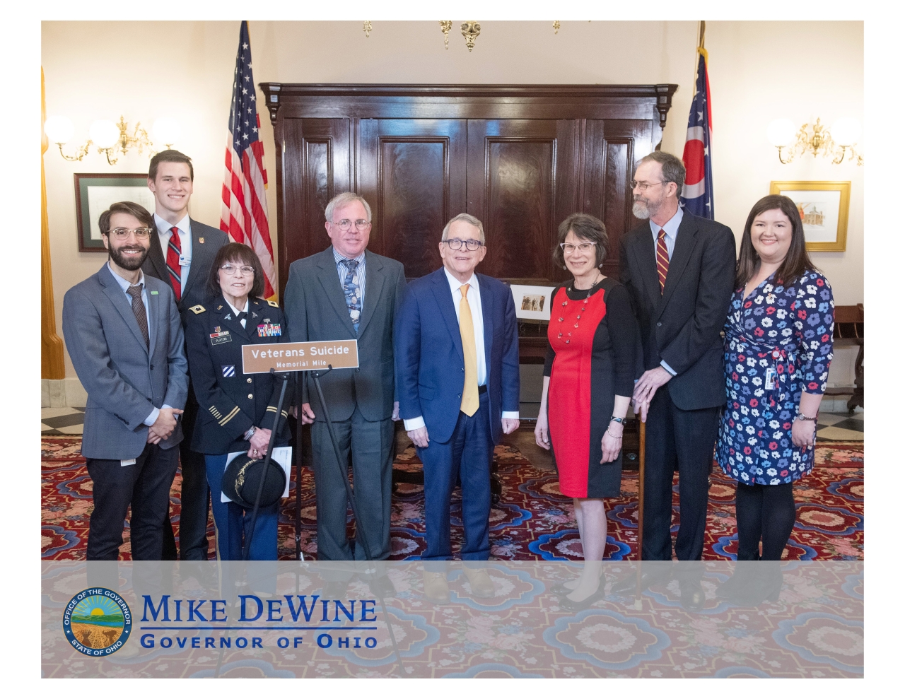 Posing with Gov. DeWine after signing a road naming bill raising awareness for veteran suicide