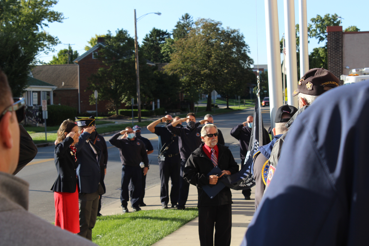 Rep. Richardson salutes the POW/MIA Flag