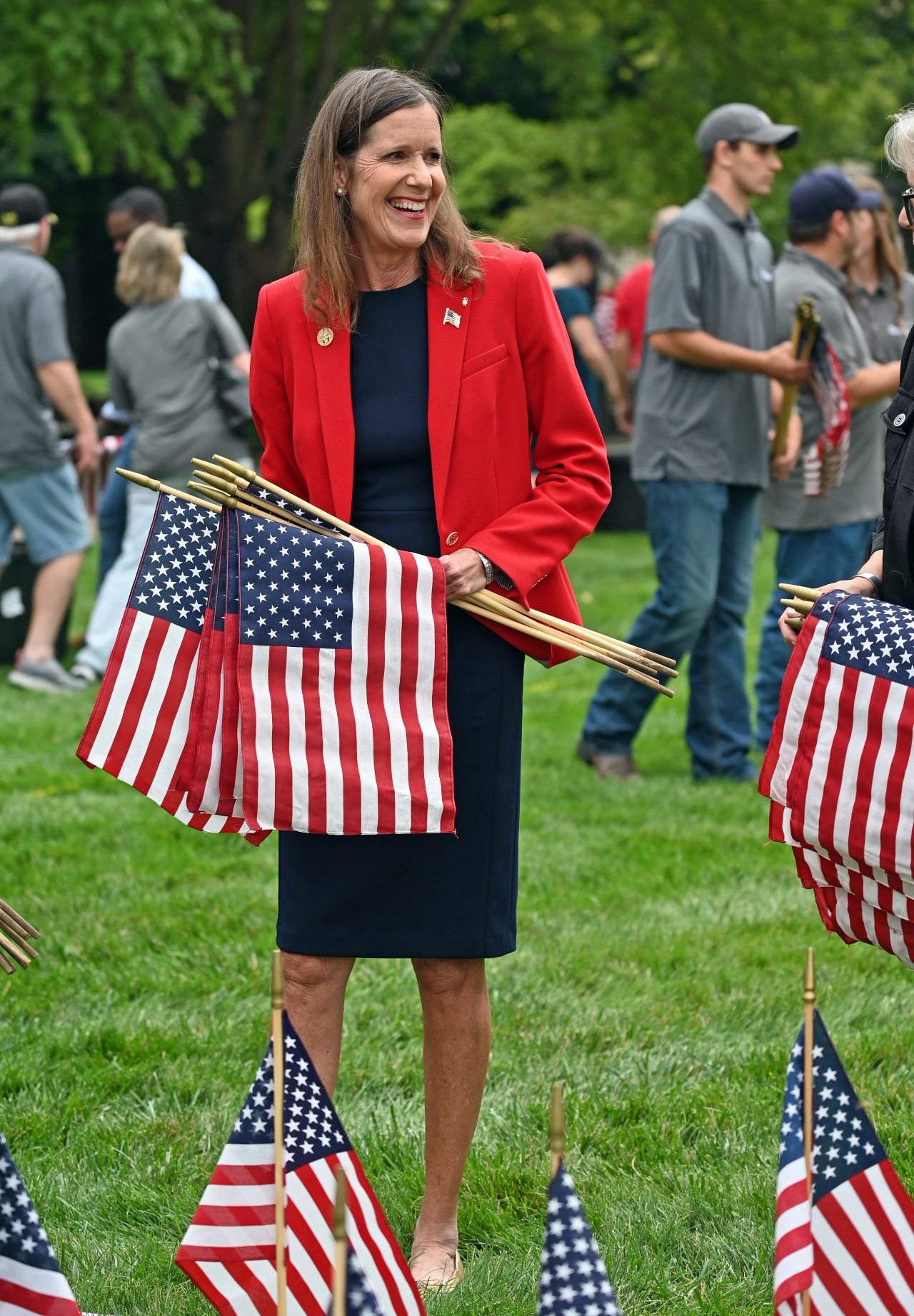 Representative Richardson assisting with the installation of the Ohio Statehouse 9/11 memorial