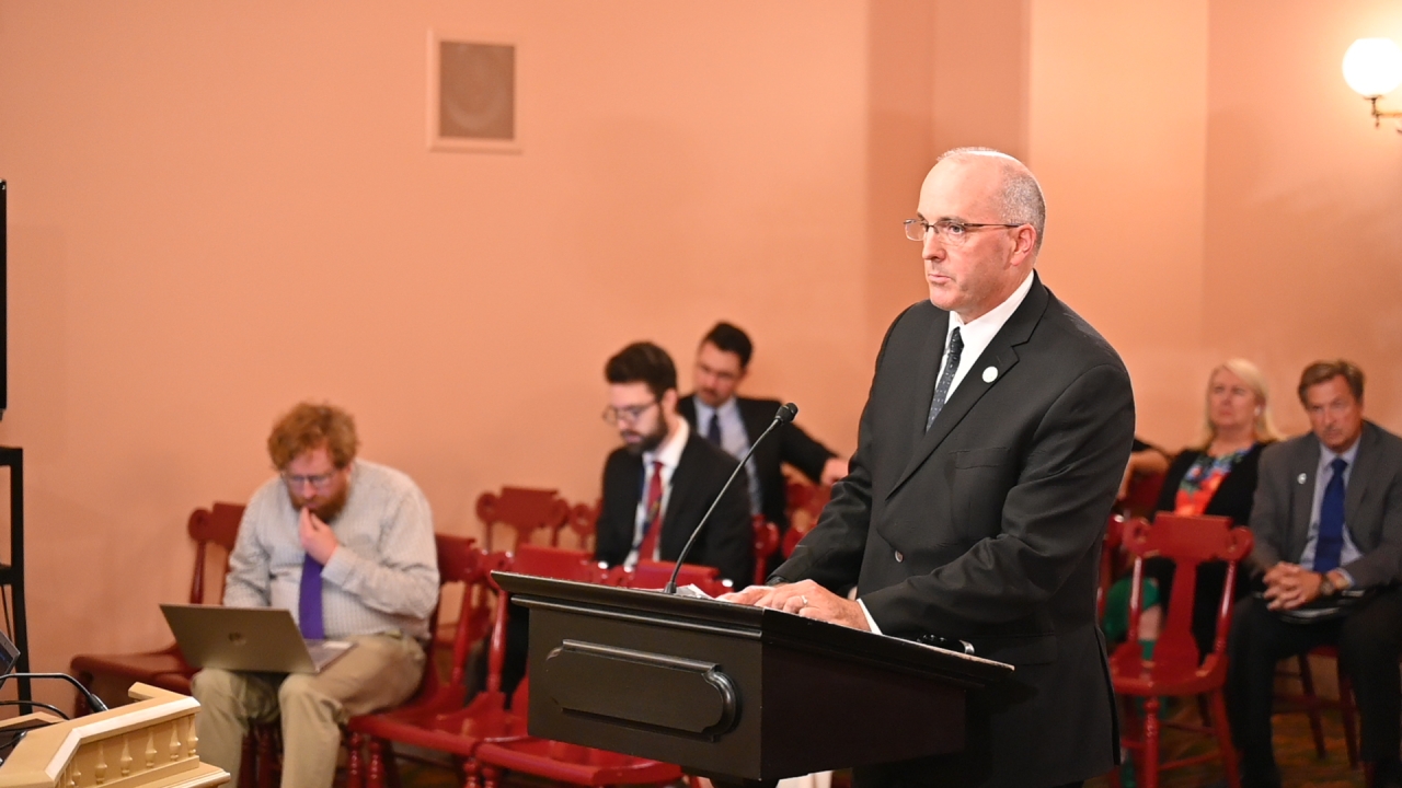 Rep. Holmes provides sponsor testimony during House Primary and Secondary Committee.