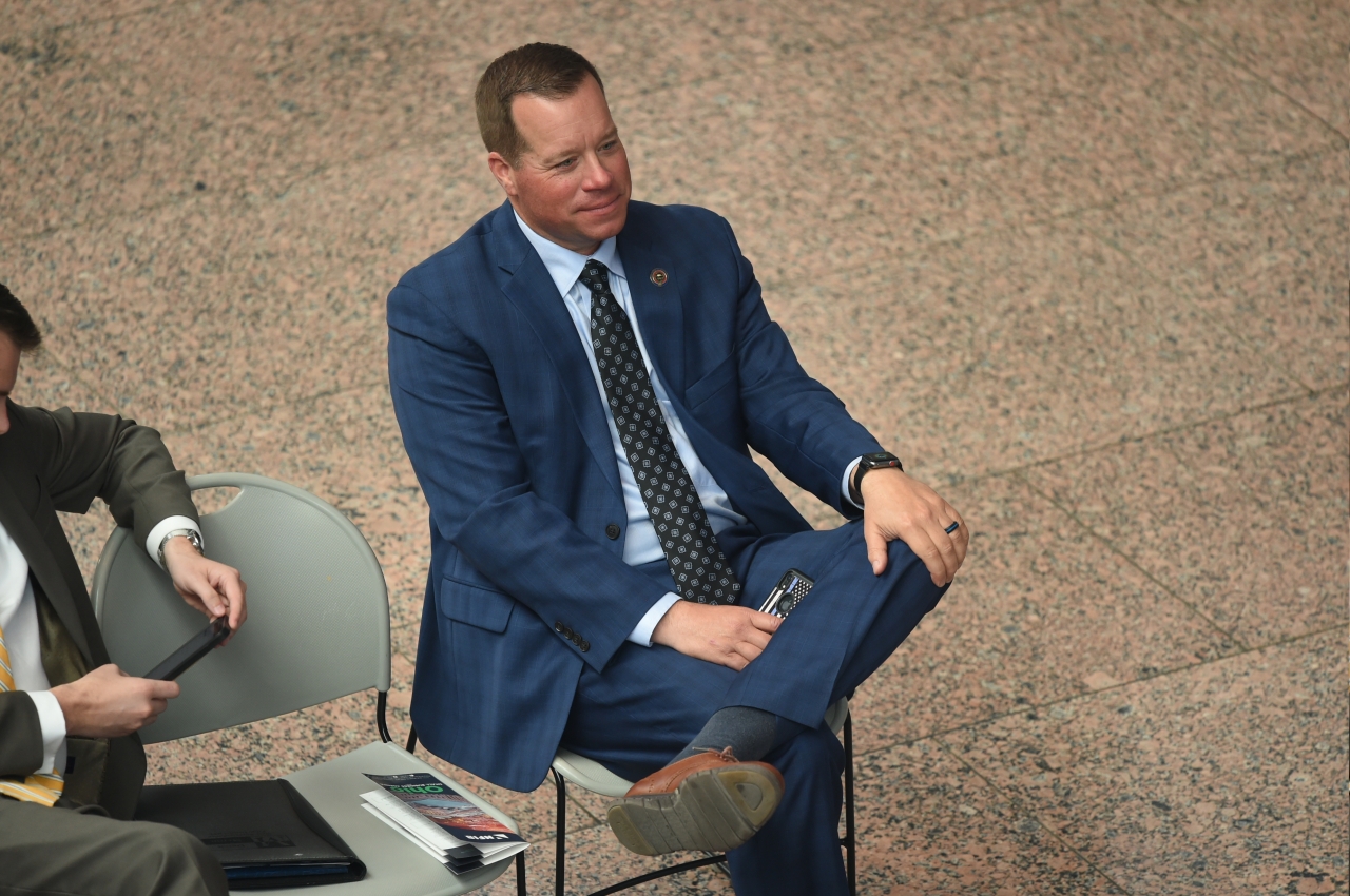 Creech attends a Business First Caucus meeting in the Statehouse atrium.