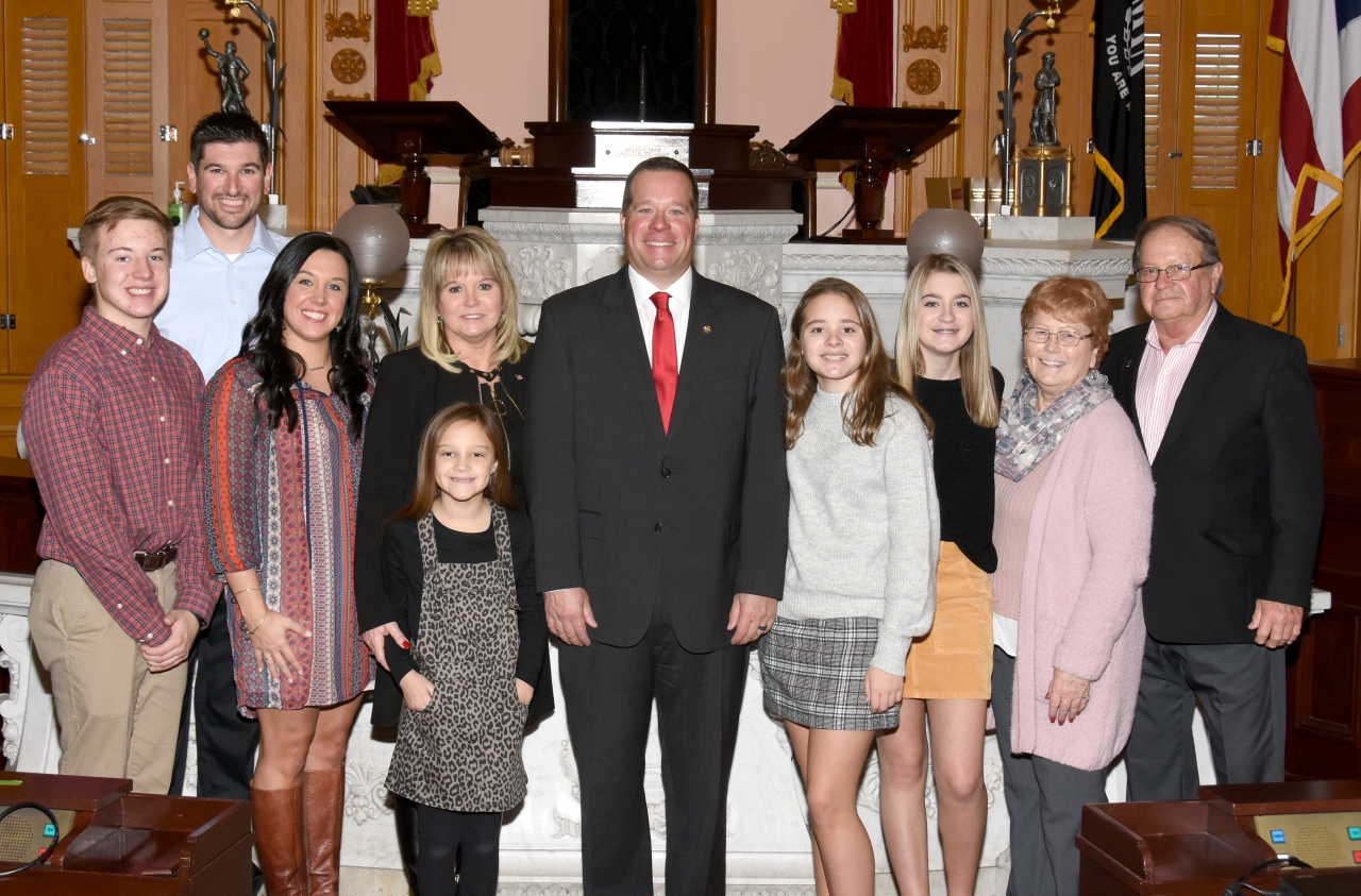 Creech surrounded by family on Opening Day of the 134th General Assembly at the Statehouse.