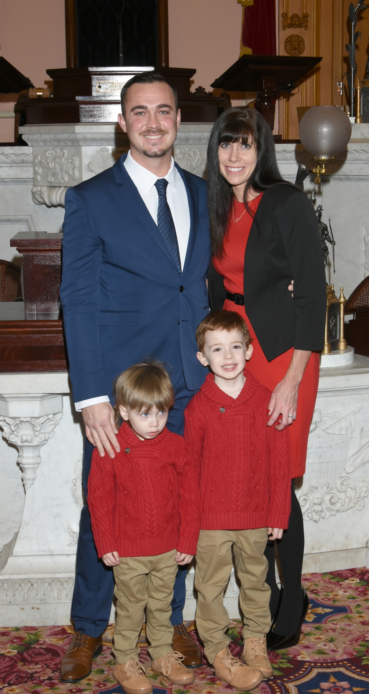 State Rep. Mike Loychik joins his family during his swearing-in ceremony