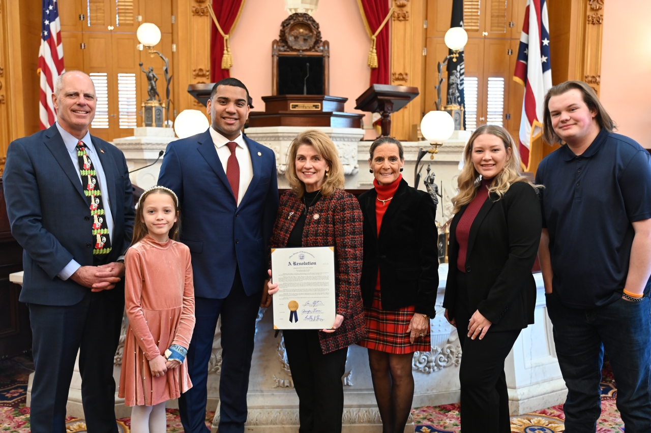 Reps. Bird, Gross, and Schmidt present a resolution to Deputy Bobby Hau Pham on the House Floor for receiving the Medal of Valor.