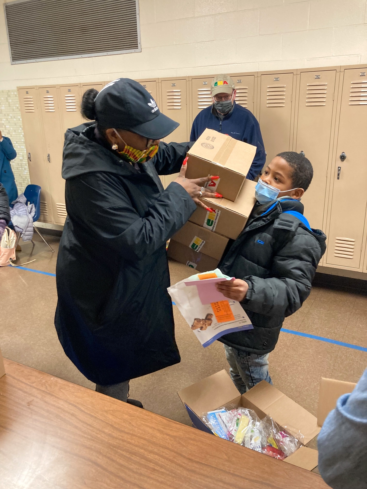 Representative Humphrey collaborates with Child Hunger Alliance to pass out weekend meal kits to children at Moler Elementary