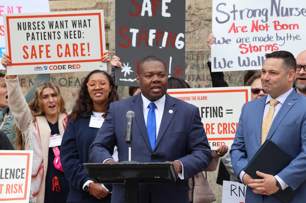 Rep. Rogers speaking at protest