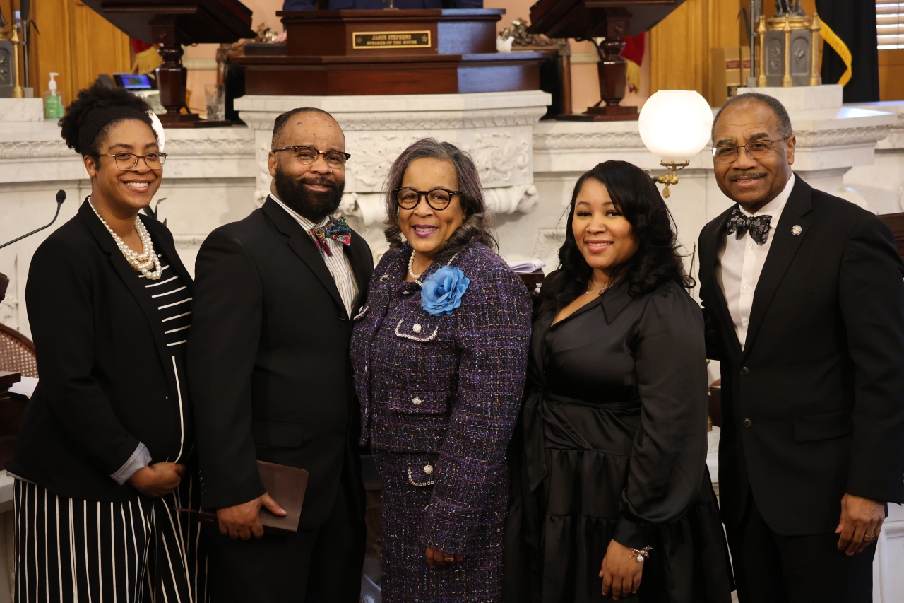 Rep. Sims with Senator Sykes and her family.