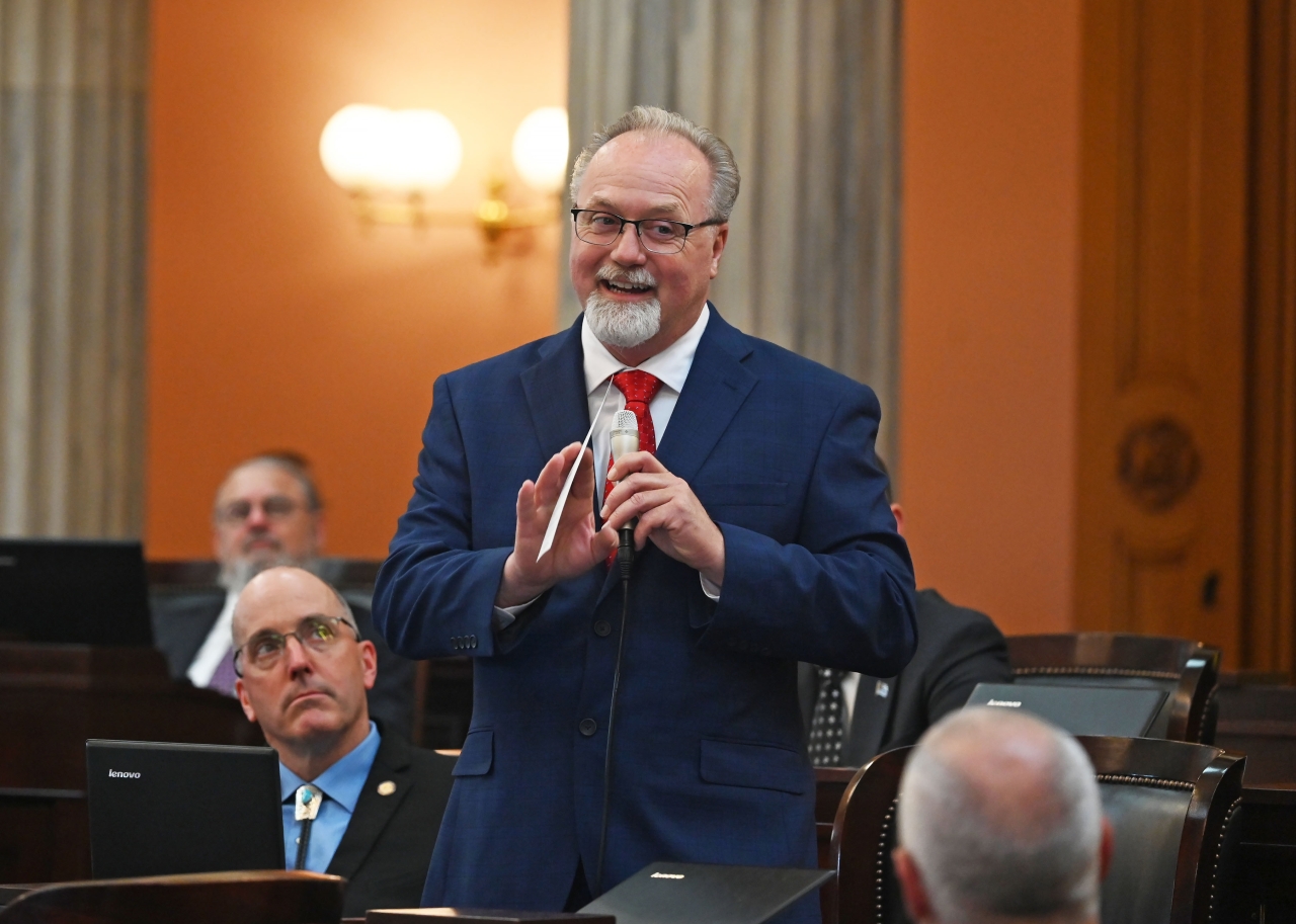 Representative Daniels speaks on the House floor during his first session.