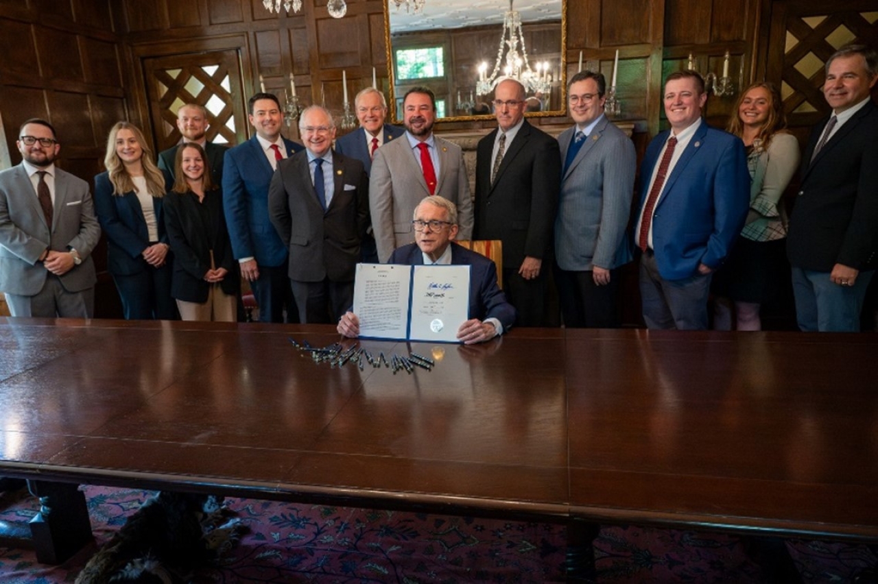 Rep. Glassburn joins fellow lawmakers to sign energy reform bill HB 15 into law.