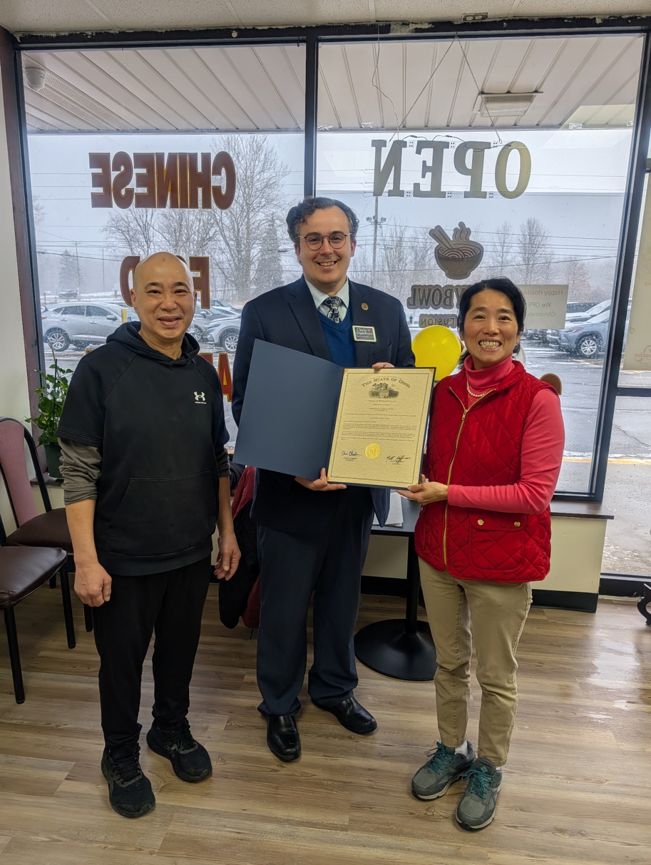 Rep. Glassburn presents an Ohio House Commendation celebrating the Grand Opening of Lucky Bowl Asian Fusion