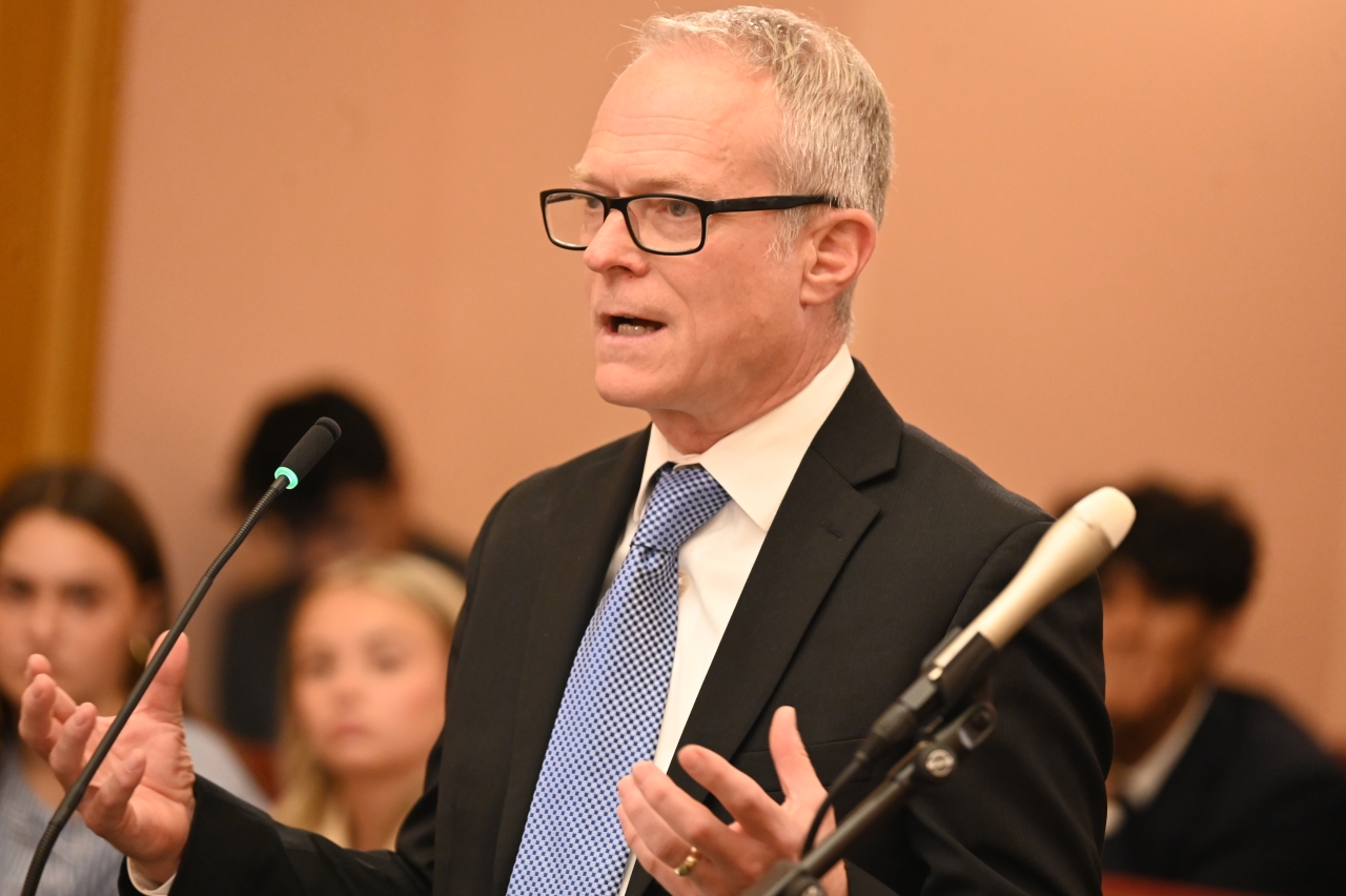 Rep. Newman testifying in Committee