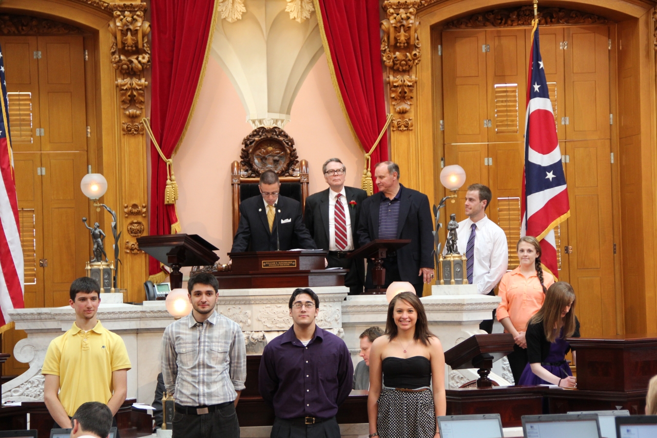 Rep. Dovilla presents a resolution to the Baldwin Wallace University racquetball team as the 2013 Division II USA Racquetball National Intercollegiate Champion